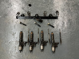 2004 Isuzu 4HK1-TC Denso 5471 / 7031 Fuel Injectors w/ Glow Plugs & Wiring Harness w/ Bolts